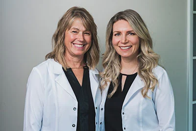 Dr. Holt and Dr. Anya, cosmetic dentists at Holt Dental